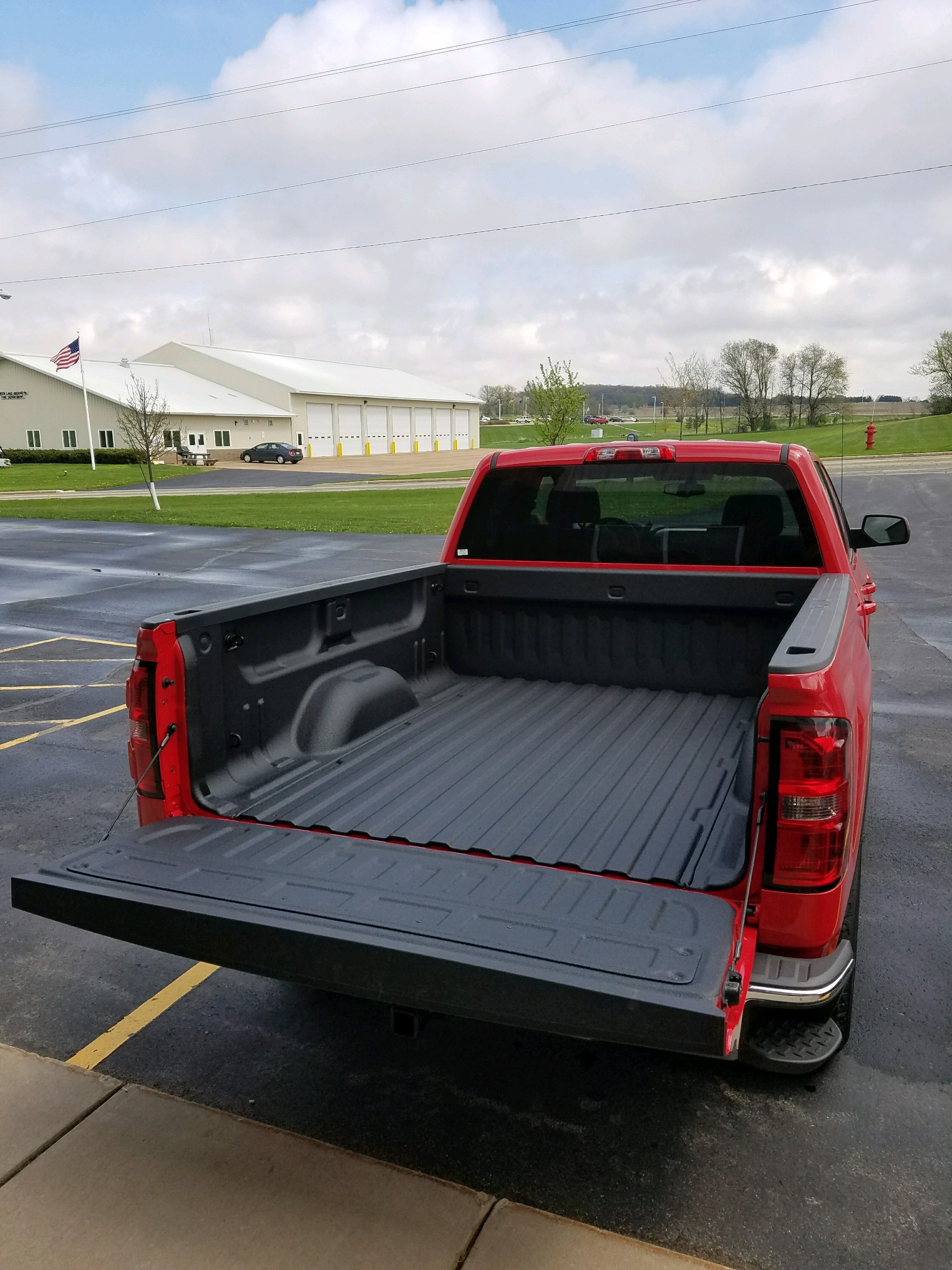 Finished truck with sprayed polyurea protection